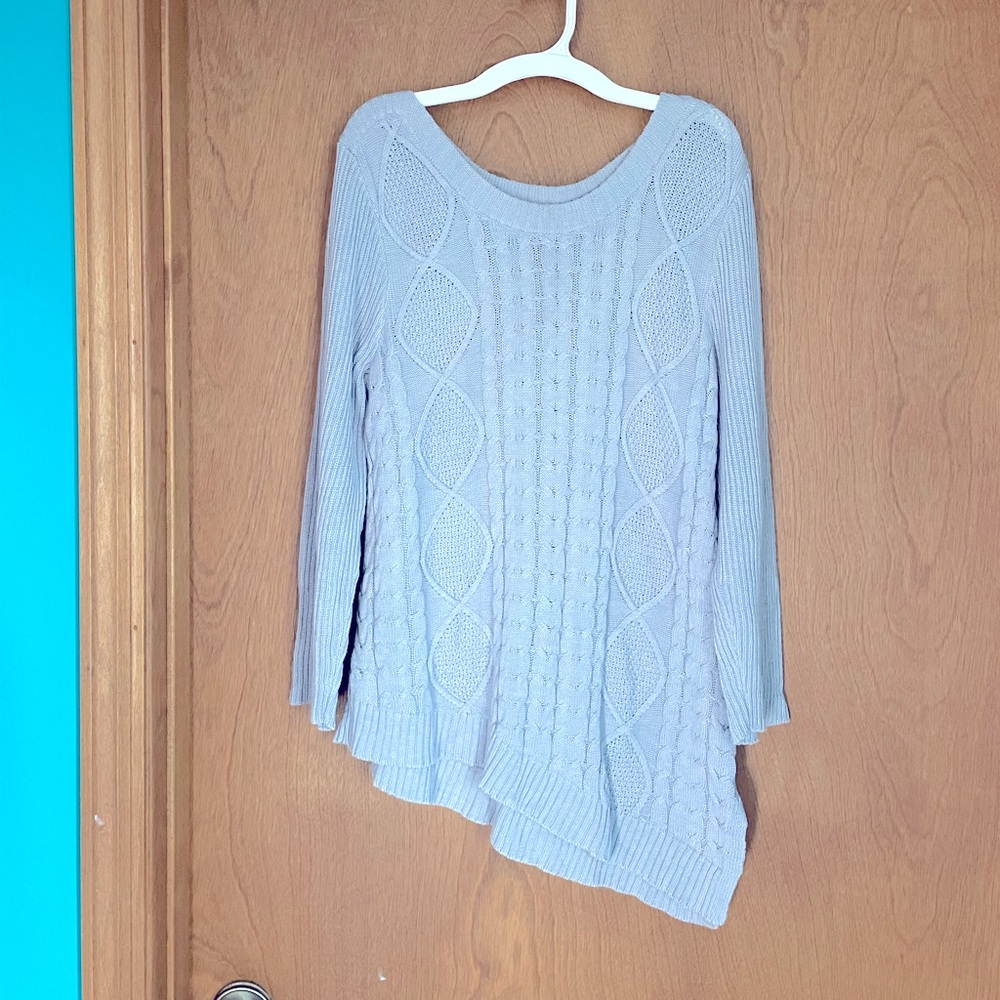 By artisan sweater